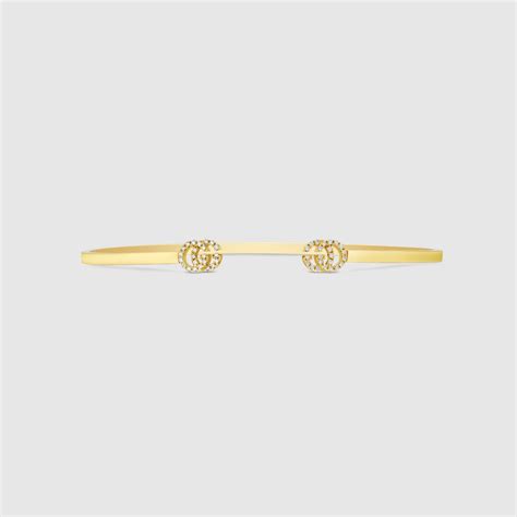 Gucci Bracciale rigido GG Running 18 carati con diamanti